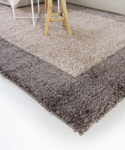 Tappeto a pelo lungo con bordo Shaggy Trend - Tortora - close up hoek