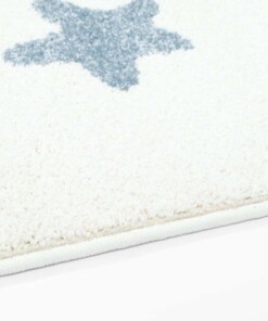 Tappeto bambini con stelle - Lyra crema/blu - close up zijkant, thumbnail Tappeto bambini con stelle - Lyra crema/blu - close up zijkant, thumbnail