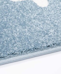 Tappeto bambini con stelle - Lyra blu/crema - close up zijkant, thumbnail