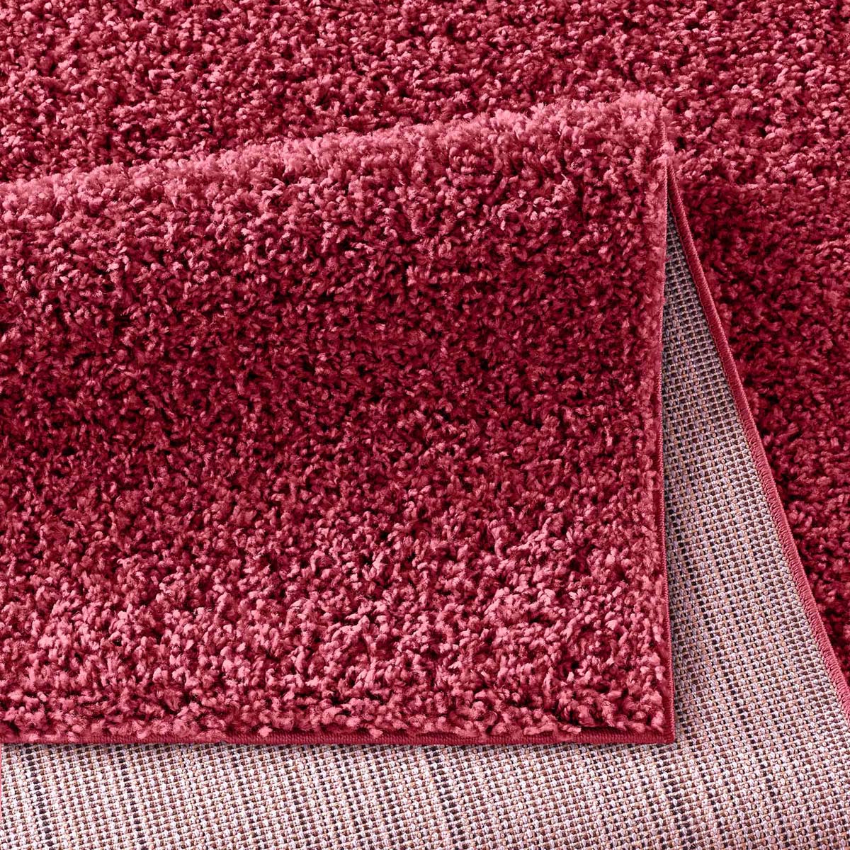 Passatoia pelo lungo - Spectrum rosso - close up vouw Passatoia pelo lungo - Spectrum rosso - close up vouw