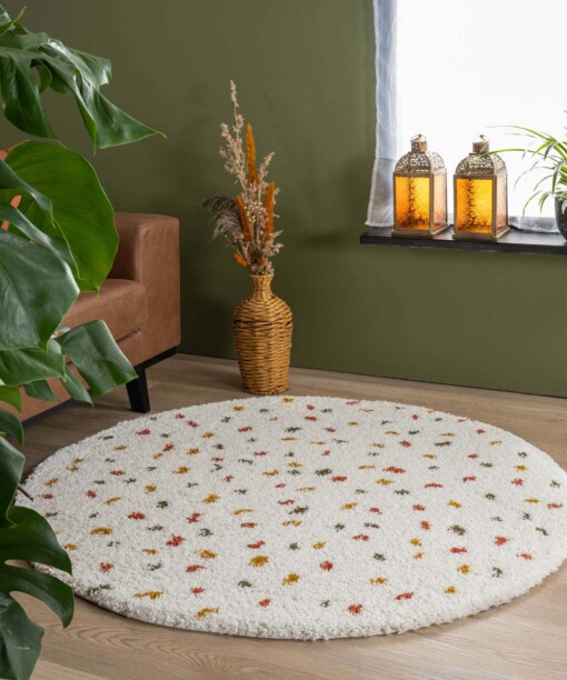 Tappeto rotondo a pelo lungo a pois Artisan - Bianco/Multicolore - sfeer