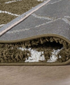 Tappeto a rombi a pelo lungo Artisan - Verde oliva/Bianco - close up vouw, thumbnail Tappeto a rombi a pelo lungo Artisan - Verde oliva/Bianco - close up vouw, thumbnail