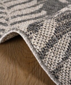 Tappeto da esterno rotondo Foglie di palma Sunny - Grigio scuro - close up zijkant, thumbnail