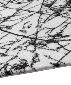 Tappeto lavabile effetto marmo - Chloé Bianco/Nero - close up zijkant, thumbnail Tappeto lavabile effetto marmo - Chloé Bianco/Nero - close up zijkant, thumbnail