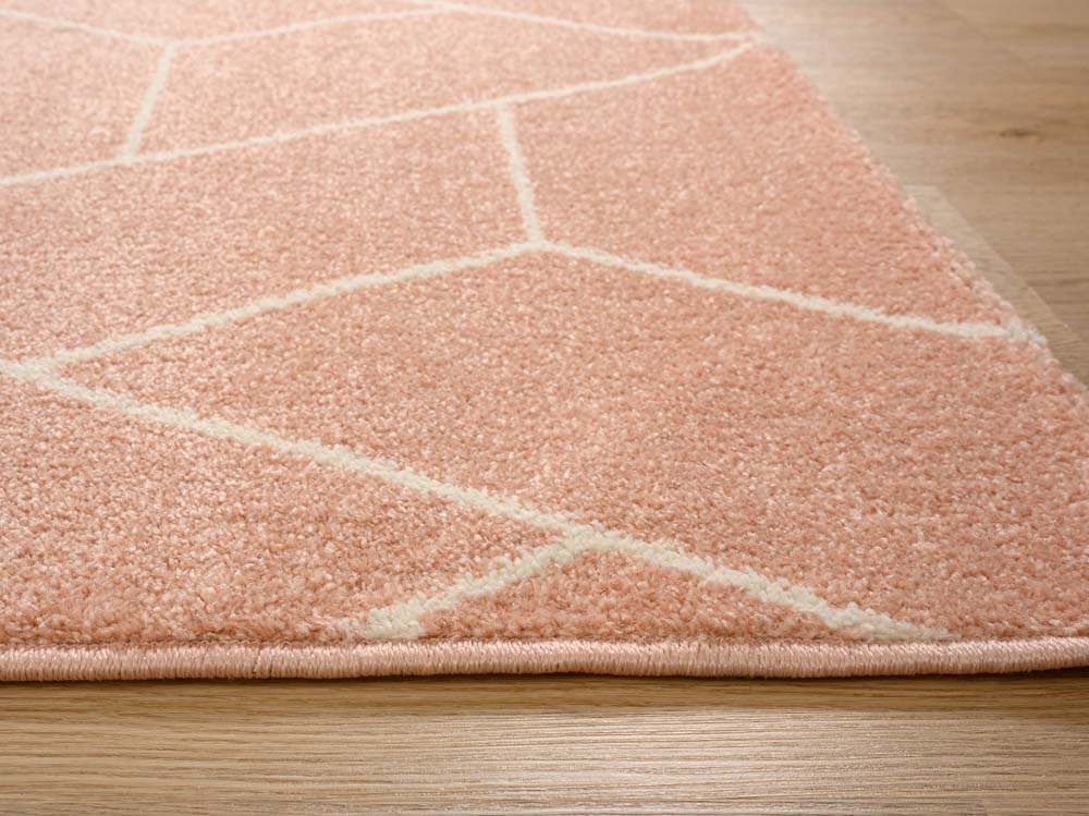 Passatoia geometrica - Aria Pyramid rosa chiaro - close up Passatoia geometrica - Aria Pyramid rosa chiaro - close up