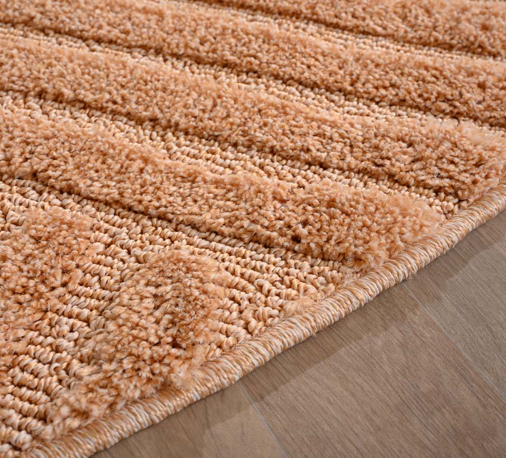 Tappeto rotondo scandinavo - Aven rosa salmone - close up Tappeto rotondo scandinavo - Aven rosa salmone - close up