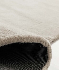 Tappeto in lana organica - Flyt Pebble avorio - close up, thumbnail