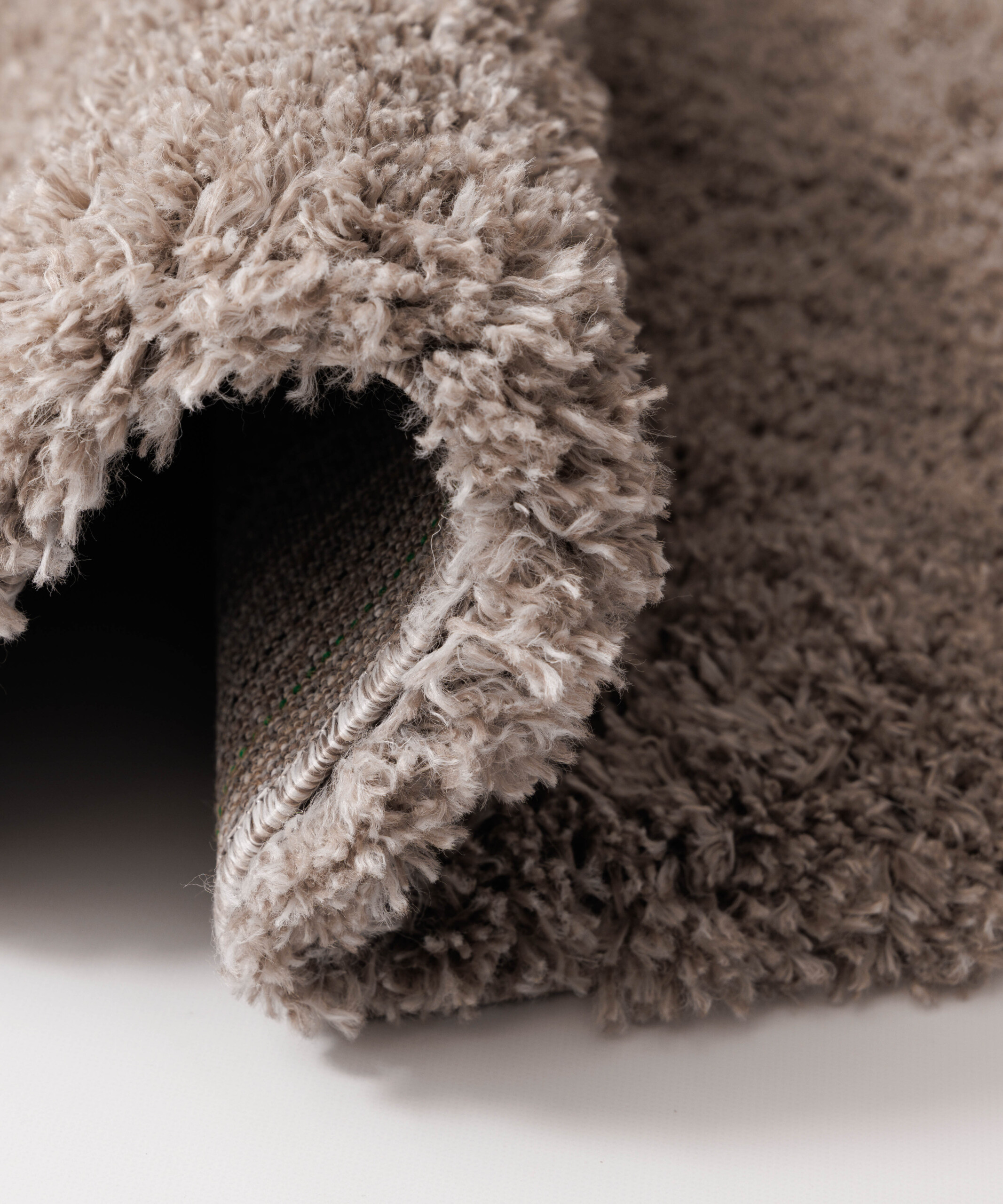Tappeto rotondo a pelo lungo Cozy Shaggy - Beige - close up Tappeto rotondo a pelo lungo Cozy Shaggy - Beige - close up