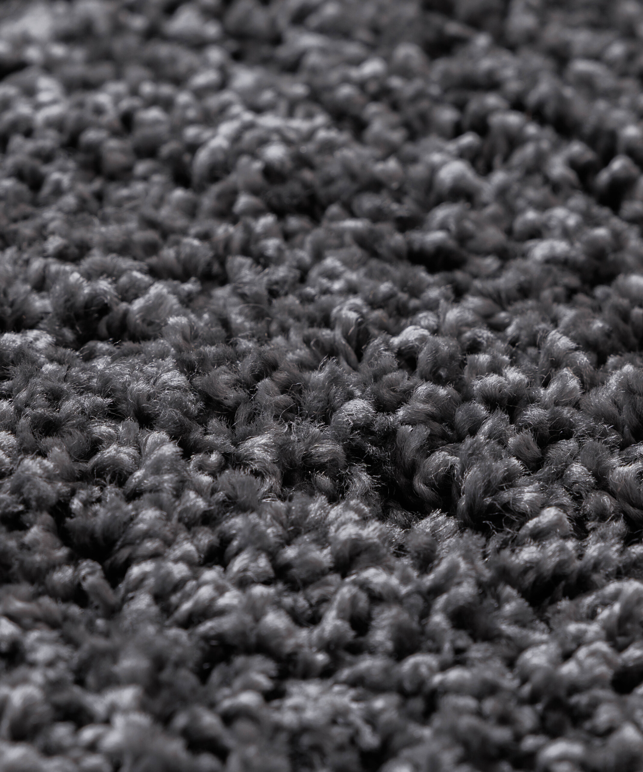 Tappeto rotondo a pelo lungo Shaggy Grand - Grigio scuro - close up Tappeto rotondo a pelo lungo Shaggy Grand - Grigio scuro - close up