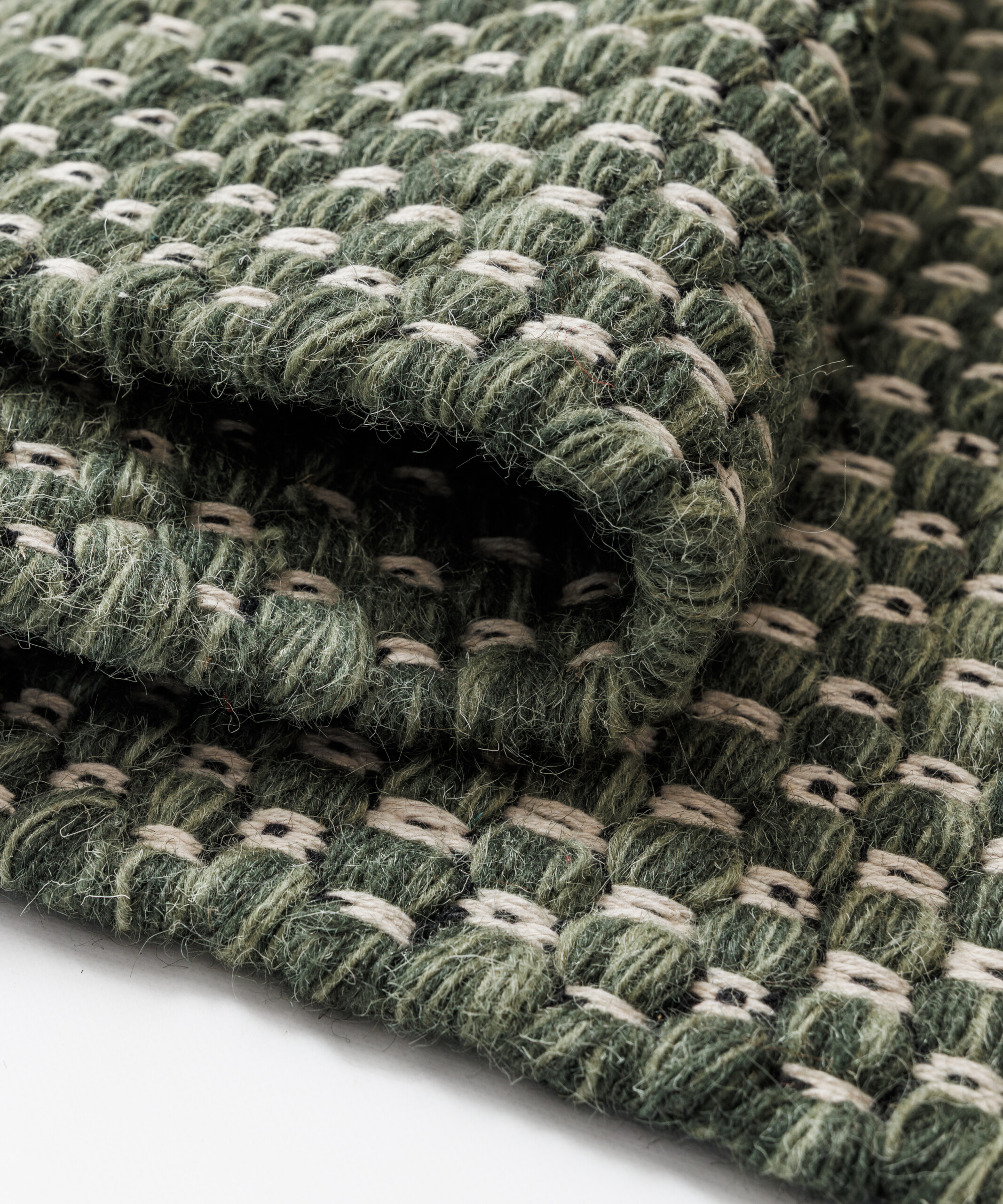 Tappeto in lana - Huldra verde - close up Tappeto in lana - Huldra verde - close up