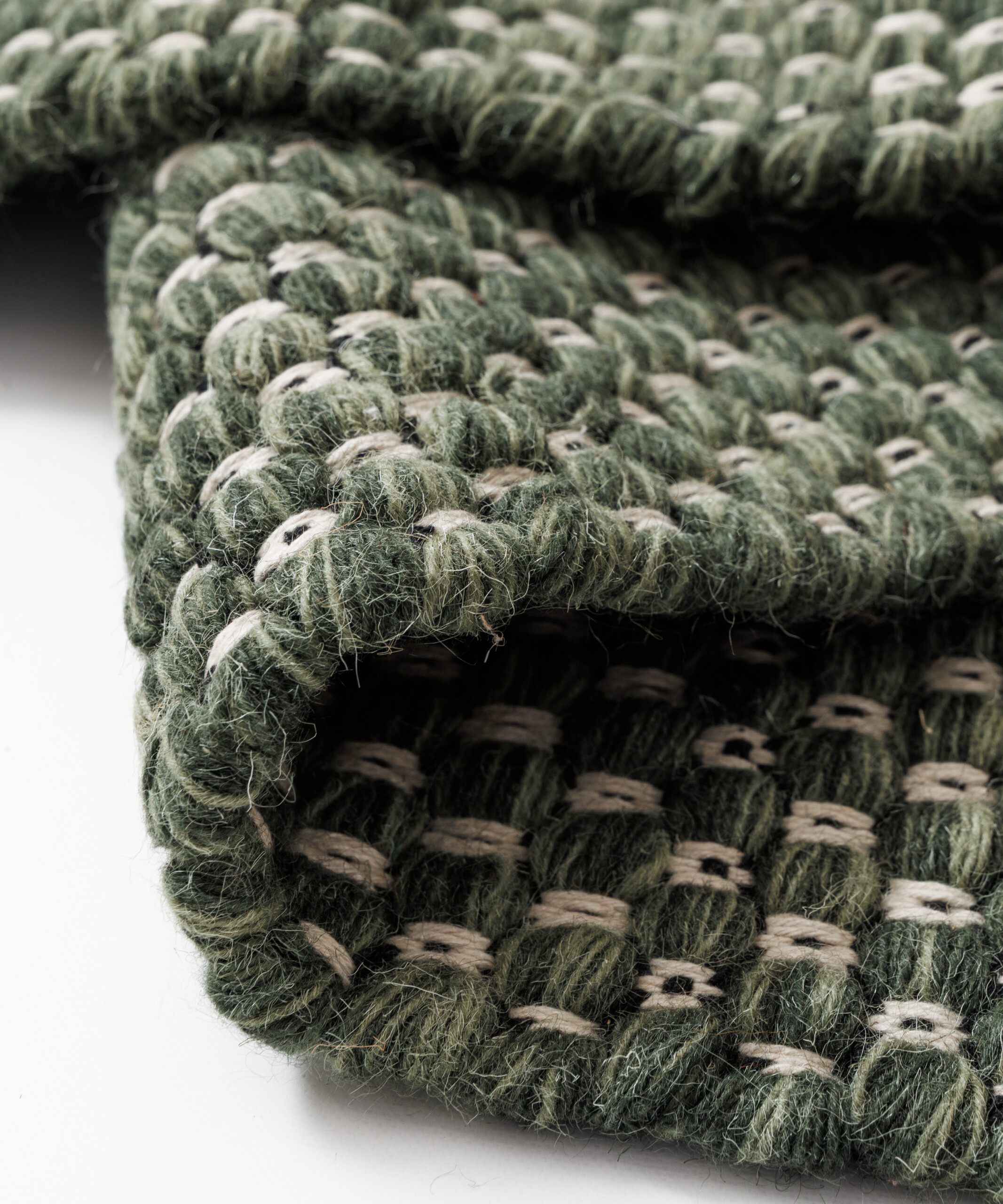 Tappeto in lana - Huldra verde - close up Tappeto in lana - Huldra verde - close up